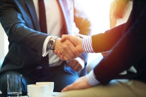 Business People Shaking Hands  Finishing Up A Meeting