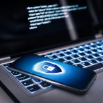 Phone Lock To Protect From Cyber Scam Online Data Fraud Or Identity Theft Laptop With Hacker Virus Code In Screen Phishing Cybersecurity Danger Or Ransomware Attack